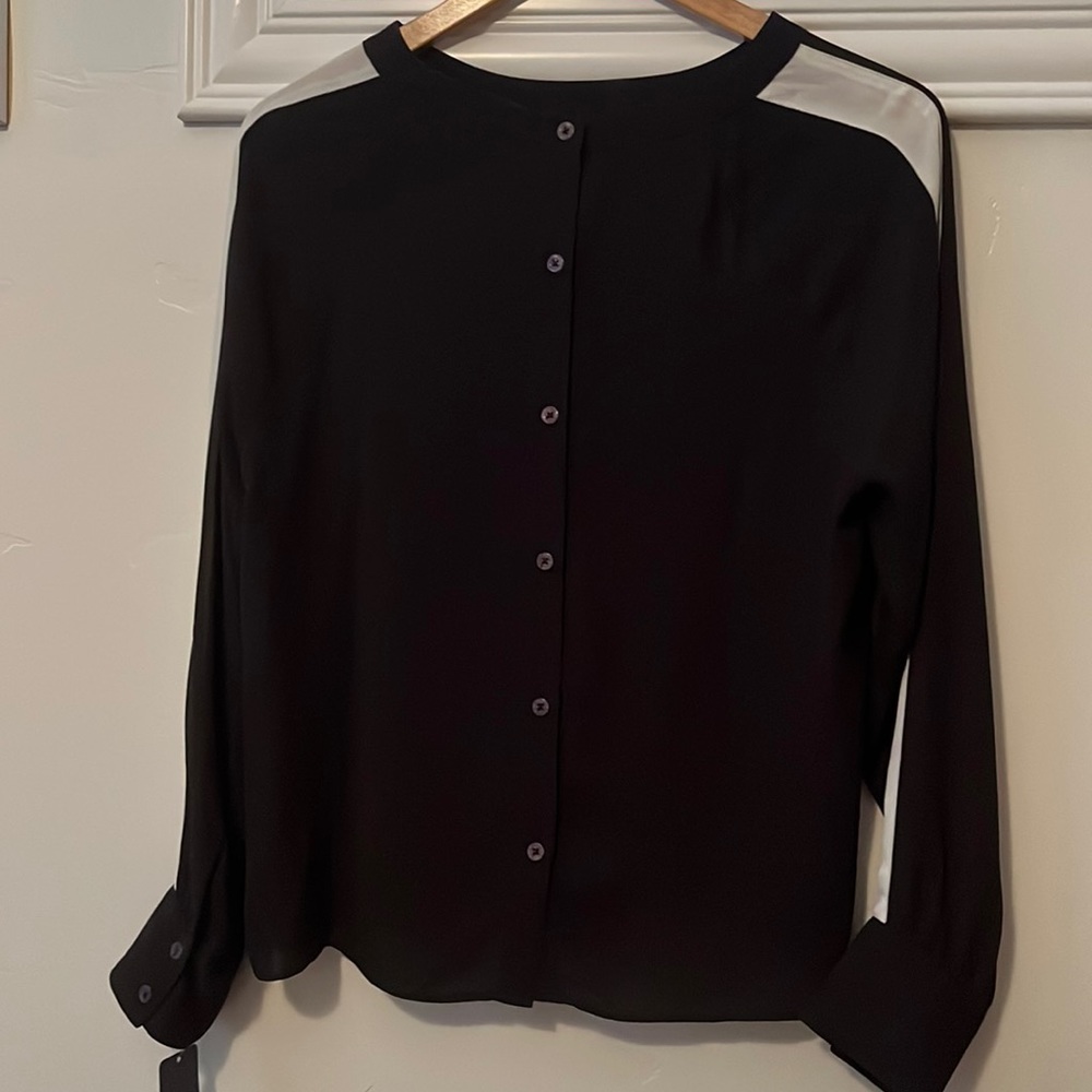 Black and white flowy, thin top. New with tags.